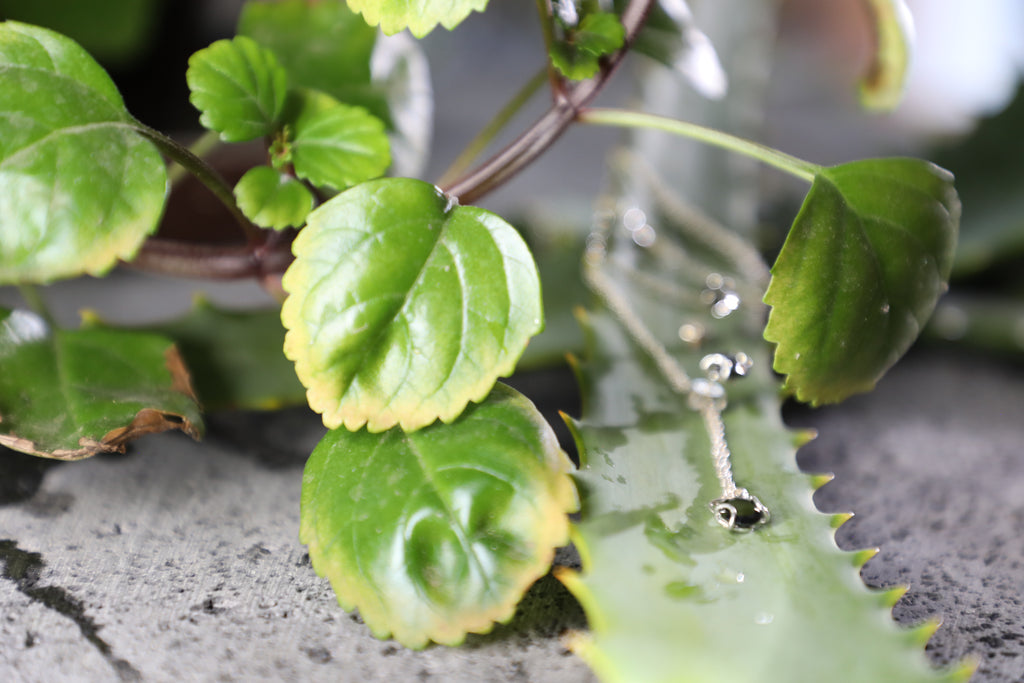 Juego de aretes y dije con zirconias plata .925