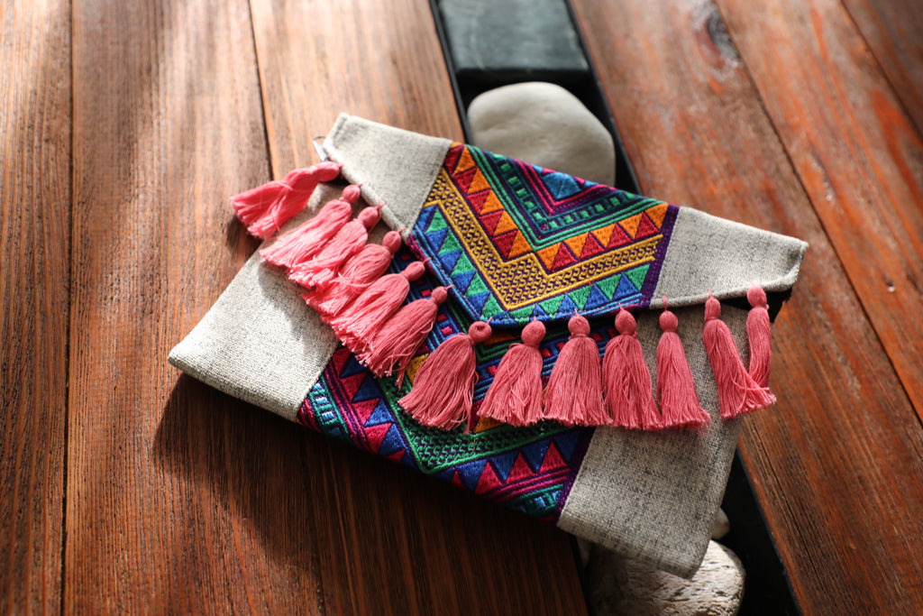 Bolsa de mano borlas rosa