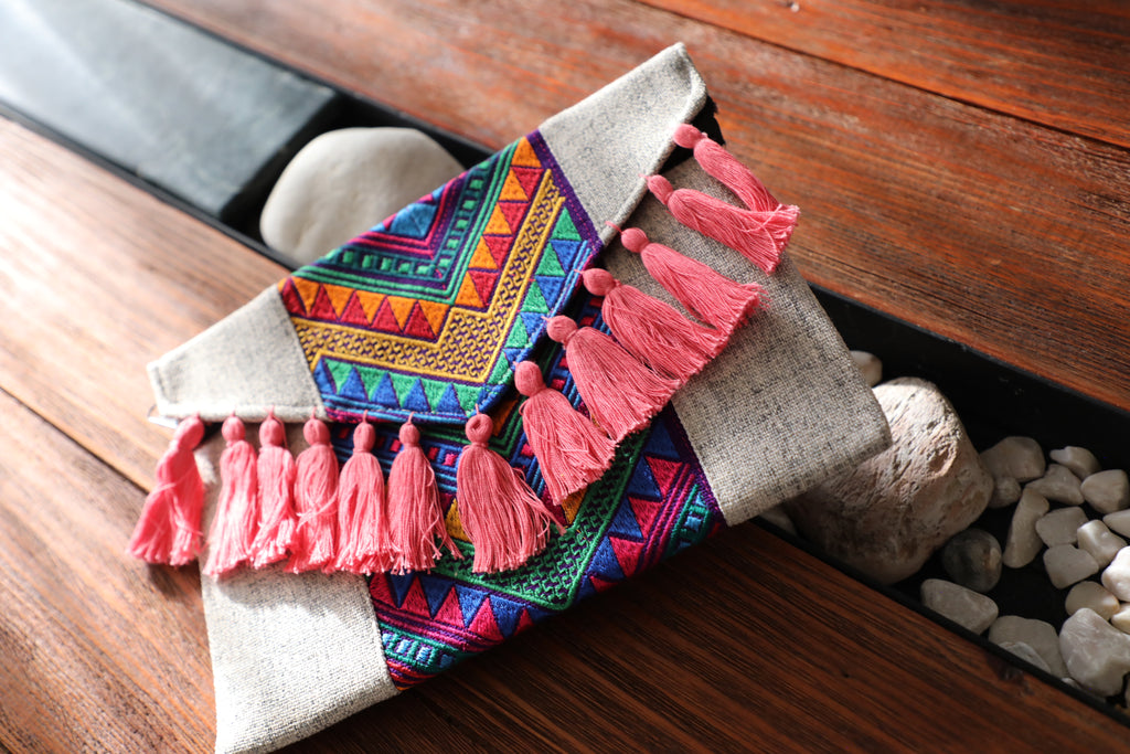 Bolsa de mano borlas rosa