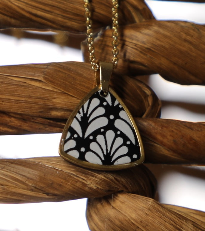 Colgante de acero con baño de oro